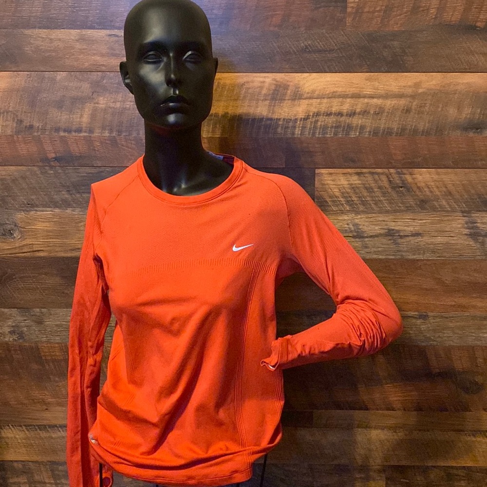 Nike Women's Long Sleeve Dri-FIT Top in Bright Orange